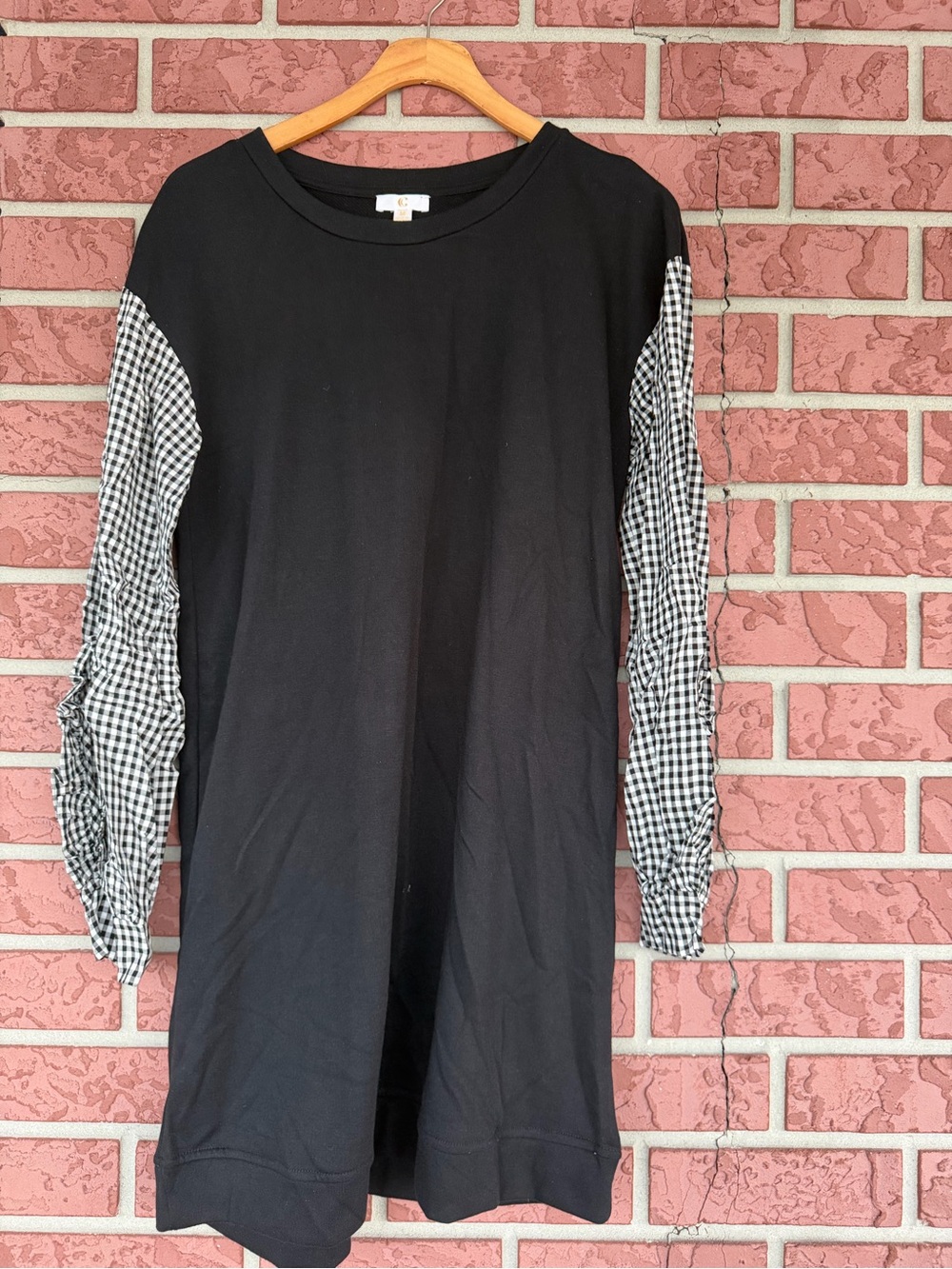 C Black Crewneck Top with Gold Accent Tag